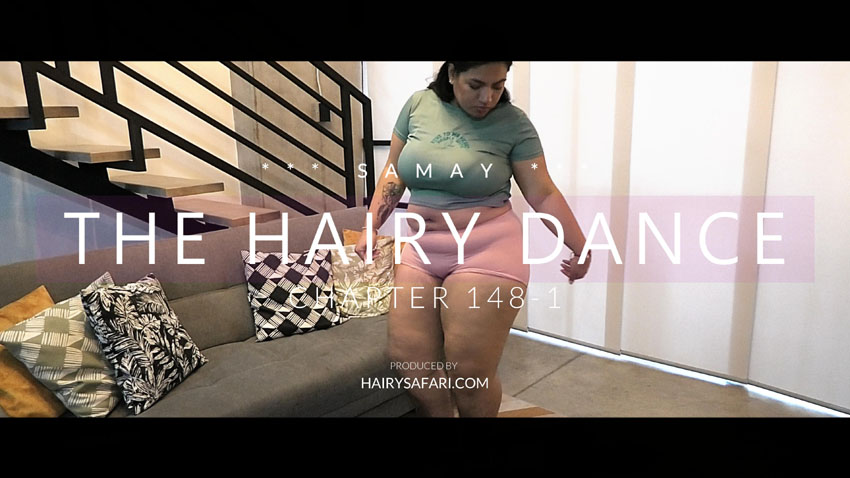 Samay begins her Hairy Dance with a teasing smile, swaying in tight hot pants that reveal her thick curves, furry ass, and insanely hairy legs